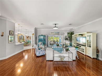 STUNNING CURB APPEAL on this GORGEOUS FULLY REMODELED PANORAMIC on Tampa Bay Golf and Country Club in Florida - for sale on GolfHomes.com, golf home, golf lot