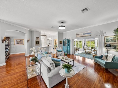 STUNNING CURB APPEAL on this GORGEOUS FULLY REMODELED PANORAMIC on Tampa Bay Golf and Country Club in Florida - for sale on GolfHomes.com, golf home, golf lot