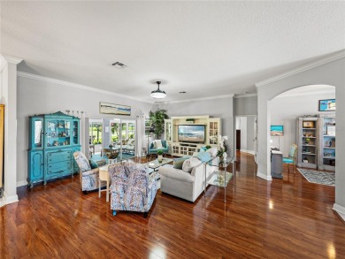 STUNNING CURB APPEAL on this GORGEOUS FULLY REMODELED PANORAMIC on Tampa Bay Golf and Country Club in Florida - for sale on GolfHomes.com, golf home, golf lot