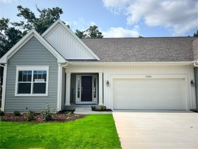 This beautiful and inviting open floor plan home on site # 2 on Angels Crossing Golf Club in Michigan - for sale on GolfHomes.com, golf home, golf lot