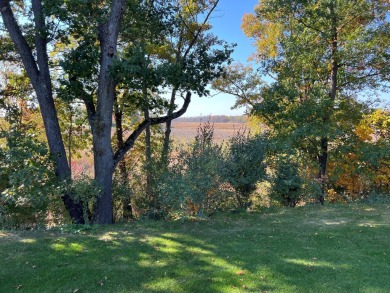 This beautiful and inviting open floor plan home on site # 2 on Angels Crossing Golf Club in Michigan - for sale on GolfHomes.com, golf home, golf lot