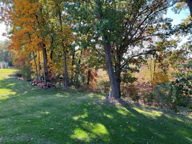 This beautiful and inviting open floor plan home on site # 2 on Angels Crossing Golf Club in Michigan - for sale on GolfHomes.com, golf home, golf lot