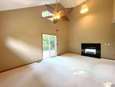 Meticulously maintained home with gorgeous lake views! Vinyl on Lake Perry Country Club in Kansas - for sale on GolfHomes.com, golf home, golf lot