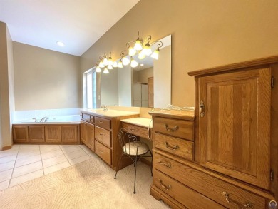 Meticulously maintained home with gorgeous lake views! Vinyl on Lake Perry Country Club in Kansas - for sale on GolfHomes.com, golf home, golf lot