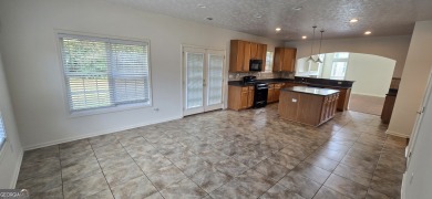 Welcome to this spacious 4-bedroom, 2.5-bath home perfectly on Indian Creek Golf Club in Georgia - for sale on GolfHomes.com, golf home, golf lot