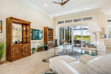 This newly built, elegant pool home backs to a serene lake on Bent Pine Golf Club in Florida - for sale on GolfHomes.com, golf home, golf lot