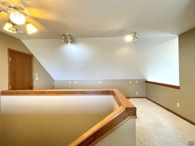 Meticulously maintained home with gorgeous lake views! Vinyl on Lake Perry Country Club in Kansas - for sale on GolfHomes.com, golf home, golf lot