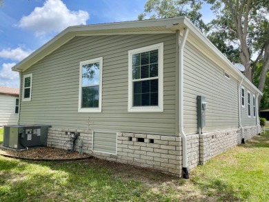 This home has barley been lived in and comes with a Transferable on Water Oak Country Club Estates in Florida - for sale on GolfHomes.com, golf home, golf lot