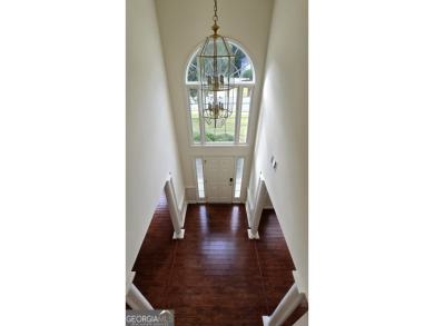 Welcome to this spacious 4-bedroom, 2.5-bath home perfectly on Indian Creek Golf Club in Georgia - for sale on GolfHomes.com, golf home, golf lot