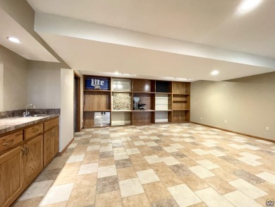Meticulously maintained home with gorgeous lake views! Vinyl on Lake Perry Country Club in Kansas - for sale on GolfHomes.com, golf home, golf lot