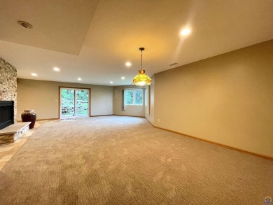 Meticulously maintained home with gorgeous lake views! Vinyl on Lake Perry Country Club in Kansas - for sale on GolfHomes.com, golf home, golf lot
