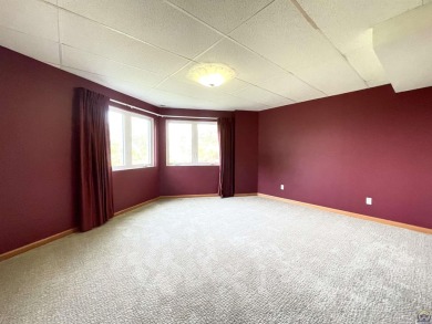 Meticulously maintained home with gorgeous lake views! Vinyl on Lake Perry Country Club in Kansas - for sale on GolfHomes.com, golf home, golf lot