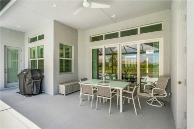 This newly built, elegant pool home backs to a serene lake on Bent Pine Golf Club in Florida - for sale on GolfHomes.com, golf home, golf lot