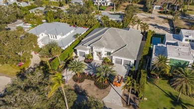 Luxurious 4 Bed/4.5 BA, 4,028 sqft home on a 100x160 lot awaits on The Moorings Country Club in Florida - for sale on GolfHomes.com, golf home, golf lot