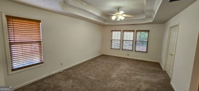 Welcome to this spacious 4-bedroom, 2.5-bath home perfectly on Indian Creek Golf Club in Georgia - for sale on GolfHomes.com, golf home, golf lot
