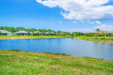 This newly built, elegant pool home backs to a serene lake on Bent Pine Golf Club in Florida - for sale on GolfHomes.com, golf home, golf lot