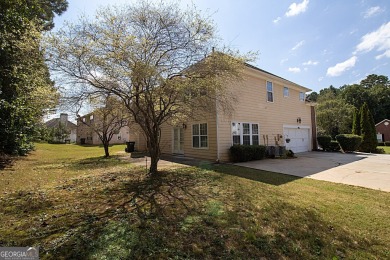 Welcome to this spacious 4-bedroom, 2.5-bath home perfectly on Indian Creek Golf Club in Georgia - for sale on GolfHomes.com, golf home, golf lot