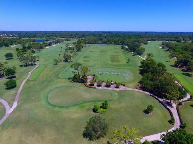 This newly built, elegant pool home backs to a serene lake on Bent Pine Golf Club in Florida - for sale on GolfHomes.com, golf home, golf lot