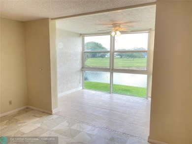 Corner 2-bedroom 2-bathroom unit with elevator and 2nd floor on Oriole Golf and Tennis Club in Florida - for sale on GolfHomes.com, golf home, golf lot