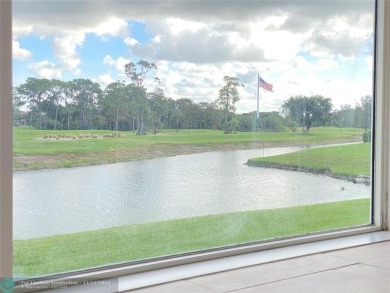 Corner 2-bedroom 2-bathroom unit with elevator and 2nd floor on Oriole Golf and Tennis Club in Florida - for sale on GolfHomes.com, golf home, golf lot