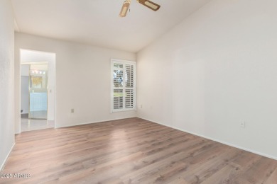 Welcome to this charming 2-bed, 2-bath Gemini home in the heart on Sun City Lakes West and East in Arizona - for sale on GolfHomes.com, golf home, golf lot