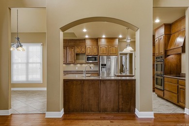 This inviting 4+ bedroom, 4-bath home blends space, style, and on Paragould Country Club in Arkansas - for sale on GolfHomes.com, golf home, golf lot