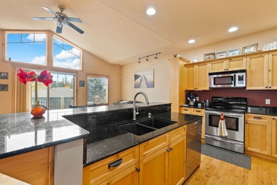 Eagle Bend Townhome with Golf Course views and peek-a-boo views on Eagle Bend Golf Course in Montana - for sale on GolfHomes.com, golf home, golf lot