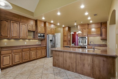 This inviting 4+ bedroom, 4-bath home blends space, style, and on Paragould Country Club in Arkansas - for sale on GolfHomes.com, golf home, golf lot