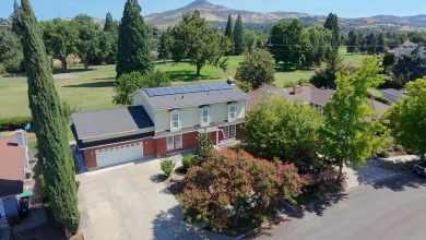 This East Medford Colonial style home with many updates sits on on Rogue Valley Country Club in Oregon - for sale on GolfHomes.com, golf home, golf lot