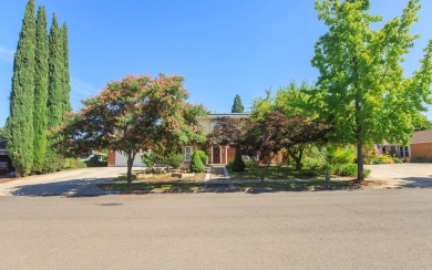 This East Medford Colonial style home with many updates sits on on Rogue Valley Country Club in Oregon - for sale on GolfHomes.com, golf home, golf lot