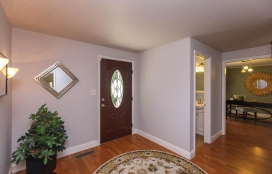 This East Medford Colonial style home with many updates sits on on Rogue Valley Country Club in Oregon - for sale on GolfHomes.com, golf home, golf lot