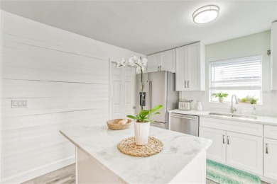 6004 Golf and Sea Blvd | 4 Bedrooms | 1.5 Bathrooms | 1,197 Sq on Apollo Beach Golf and Sea Club in Florida - for sale on GolfHomes.com, golf home, golf lot