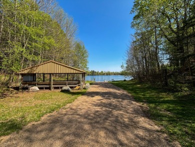 Prime location alert! Nestled on a one-acre lot bordering the on Maplewood Golf Course in Wisconsin - for sale on GolfHomes.com, golf home, golf lot