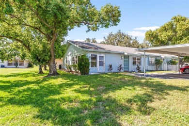 Enjoy easy living in this charming 2-bedroom, 2-bath end unit on Kings Point Executive Golf Course in Florida - for sale on GolfHomes.com, golf home, golf lot