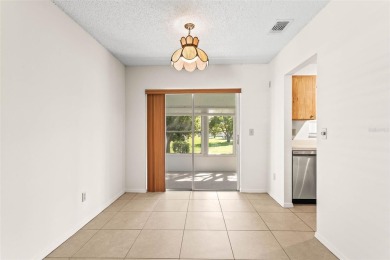 Enjoy easy living in this charming 2-bedroom, 2-bath end unit on Kings Point Executive Golf Course in Florida - for sale on GolfHomes.com, golf home, golf lot