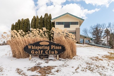 Welcome to this desirable single-level ranch in Fairways of on Whispering Pines Golf  in Michigan - for sale on GolfHomes.com, golf home, golf lot