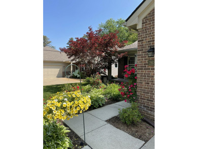 Welcome to this desirable single-level ranch in Fairways of on Whispering Pines Golf  in Michigan - for sale on GolfHomes.com, golf home, golf lot