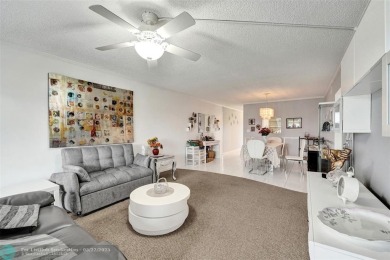 Ready to retire or just enjoy a nice vacation? Welcome to on Wynmoor Golf Course in Florida - for sale on GolfHomes.com, golf home, golf lot