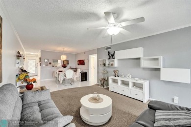Ready to retire or just enjoy a nice vacation? Welcome to on Wynmoor Golf Course in Florida - for sale on GolfHomes.com, golf home, golf lot