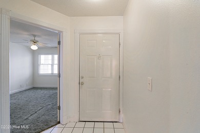 Opportunity knocks with this 1-bedroom condo in a gated golf on Brunswick Plantation and Golf Resorts in North Carolina - for sale on GolfHomes.com, golf home, golf lot