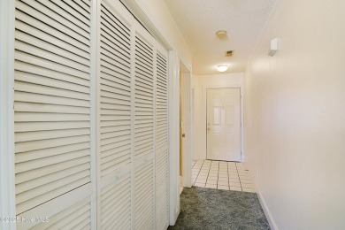 Opportunity knocks with this 1-bedroom condo in a gated golf on Brunswick Plantation and Golf Resorts in North Carolina - for sale on GolfHomes.com, golf home, golf lot
