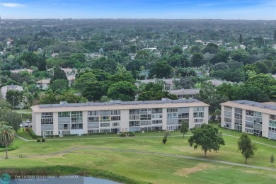 Ready to retire or just enjoy a nice vacation? Welcome to on Wynmoor Golf Course in Florida - for sale on GolfHomes.com, golf home, golf lot