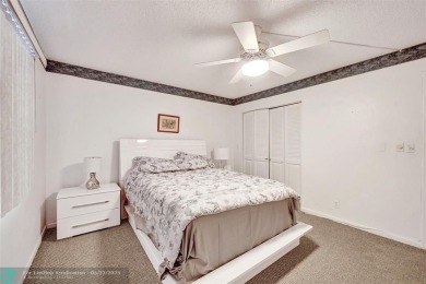 Ready to retire or just enjoy a nice vacation? Welcome to on Wynmoor Golf Course in Florida - for sale on GolfHomes.com, golf home, golf lot