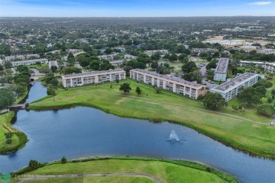 Ready to retire or just enjoy a nice vacation? Welcome to on Wynmoor Golf Course in Florida - for sale on GolfHomes.com, golf home, golf lot