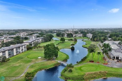 Ready to retire or just enjoy a nice vacation? Welcome to on Wynmoor Golf Course in Florida - for sale on GolfHomes.com, golf home, golf lot