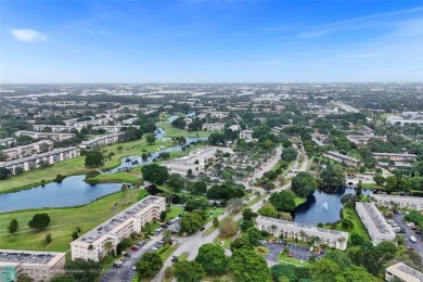 Ready to retire or just enjoy a nice vacation? Welcome to on Wynmoor Golf Course in Florida - for sale on GolfHomes.com, golf home, golf lot