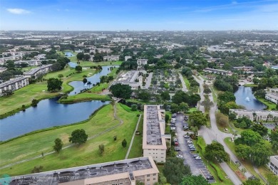 Ready to retire or just enjoy a nice vacation? Welcome to on Wynmoor Golf Course in Florida - for sale on GolfHomes.com, golf home, golf lot