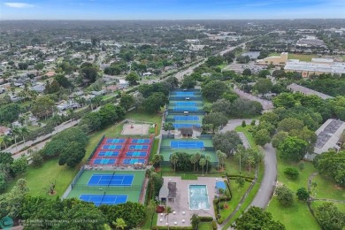 Ready to retire or just enjoy a nice vacation? Welcome to on Wynmoor Golf Course in Florida - for sale on GolfHomes.com, golf home, golf lot