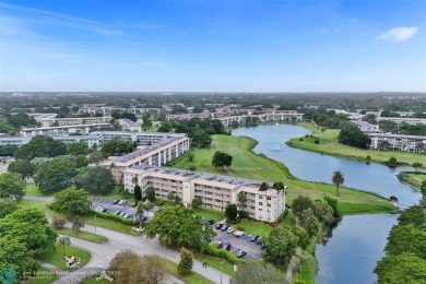 Ready to retire or just enjoy a nice vacation? Welcome to on Wynmoor Golf Course in Florida - for sale on GolfHomes.com, golf home, golf lot
