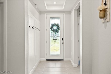 This beautifully designed four-bedroom home offers an on Palmetto-Pine Country Club in Florida - for sale on GolfHomes.com, golf home, golf lot